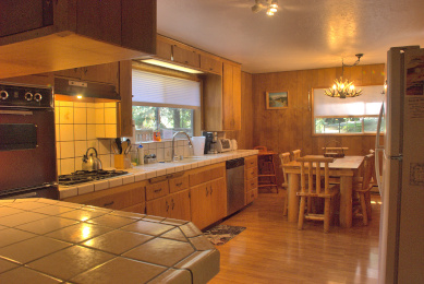 View of kitchen from bar